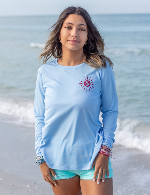 woman-wearing-upf-shirt-light-blue-front-mermaid-design.jpg